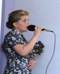 Photo 17  - 2014 Exhibition - Rebekah singing WW1 & WW2 Songs